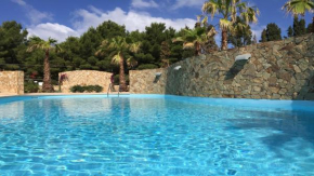 RESIDENCE ELEGANCE ville ed appartamenti a Porto Pino